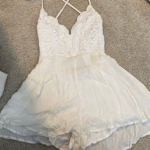 Lulu’s ivory backless romper